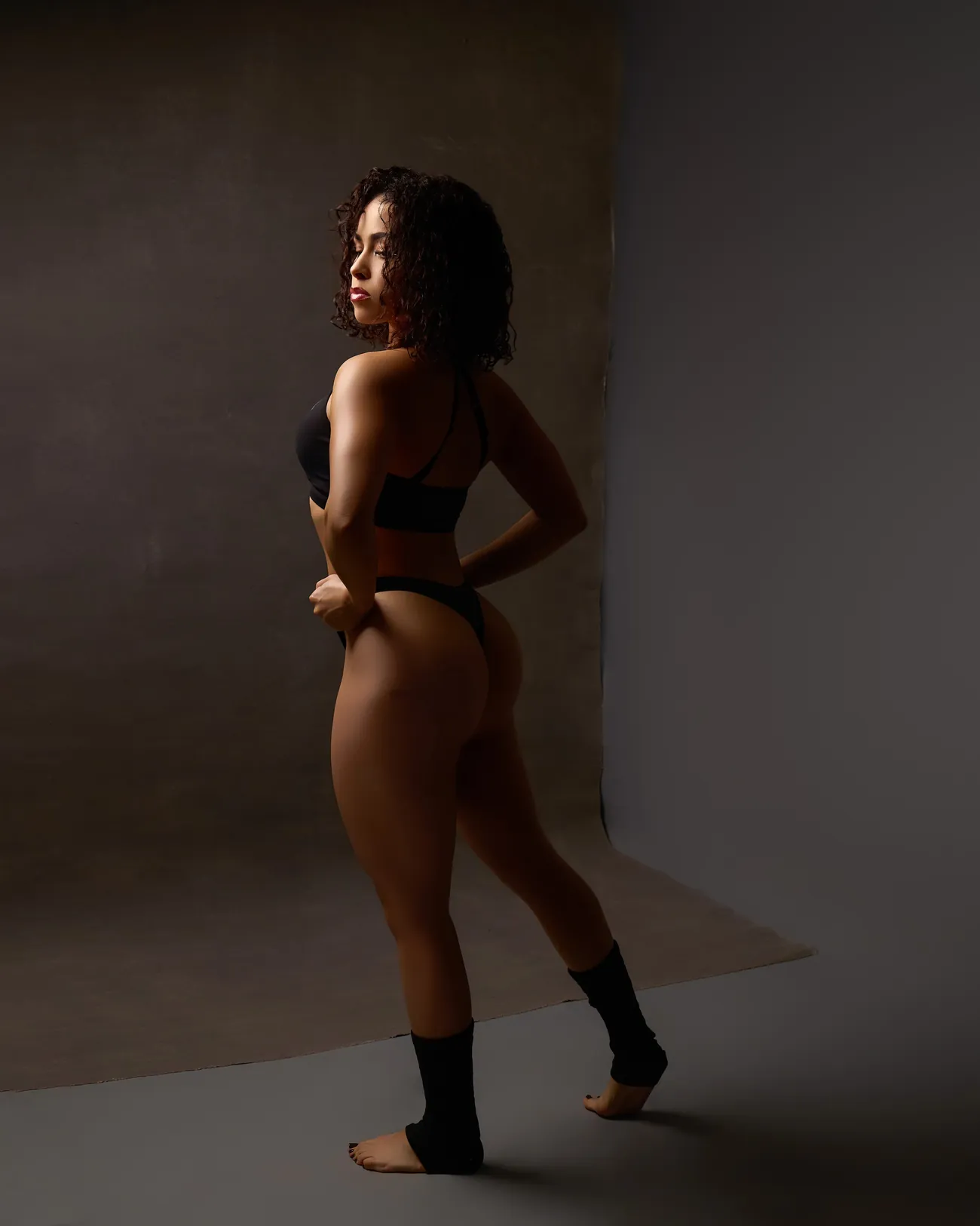 Alexa looking over her shoulder, studio portrait